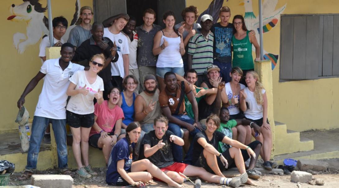 A group relaxing after doing some painting in Ghana A group relaxing after doing some painting in Ghana